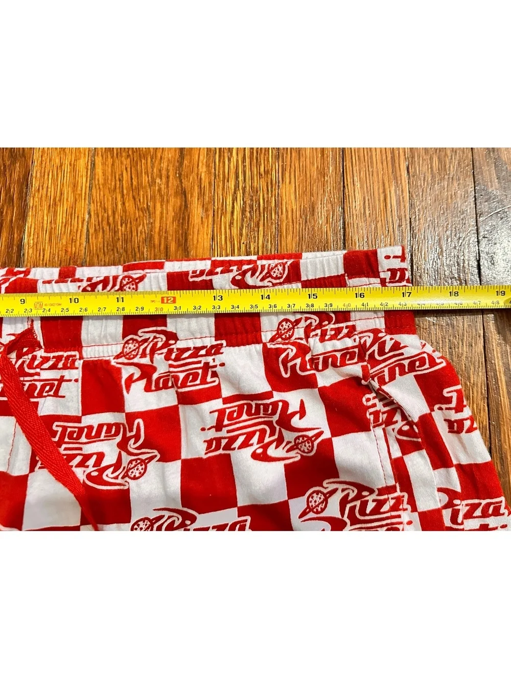 Men’s Large Disney's Pixar Toy Story Pizza Planet Checkered Lounge Shorts in Red